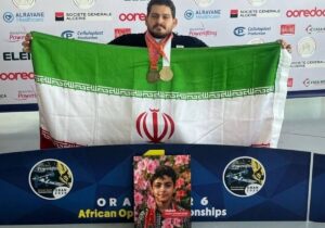 ایزدی مدالهای طلا و برنز خود را به شهید ماکان نصیری اهدا کرد